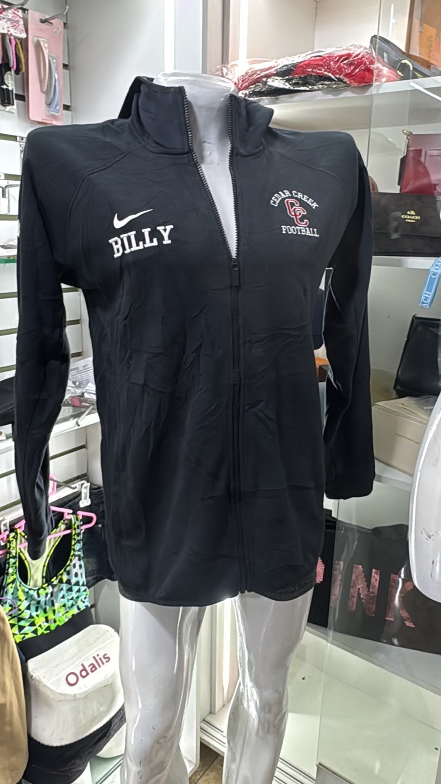 Chompa deportiva negra de caballero